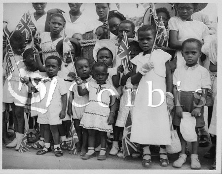 Nigerian-Children-Welcome-the-Queen-Elizabeth-II-Lagos-Nigeria.jpg