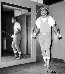 Dick Tiger in sweats skips rope
New York City
November 12, 1963
