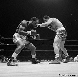 Jose Torres (right) punches Dick Tiger
New York City
May 16, 1967