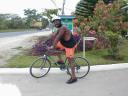 Emeagwali, bicycling from Grand Lido resorts to downtown Negril, Jamaica
